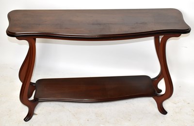 Lot 1655 - A walnut two tier console table