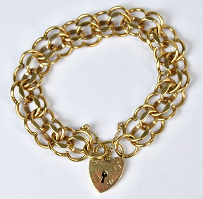 Lot 798 - A 9ct yellow gold multi-link chain bracelet,...