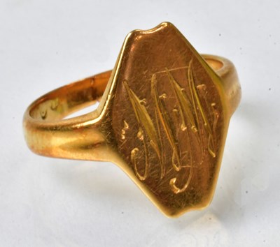 Lot 792 - A yellow metal signet ring, the diamond-shaped...
