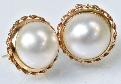 Lot 833 - A pair of 9ct yellow gold pearl stud earrings...