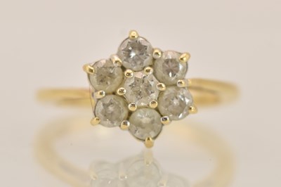 Lot 1338 - An 18ct yellow gold diamond set floral cluster...