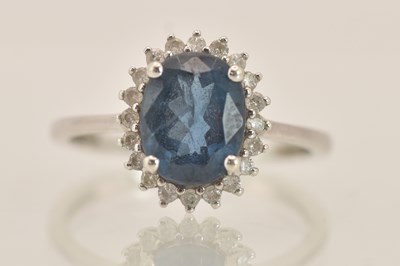 Lot 1413 - A 9ct white gold dress ring, with central claw...