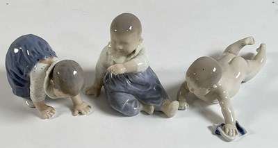 Lot 284 - ROYAL COPENHAGEN; three figures of babies,...