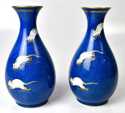 Lot 163 - WEDGWOOD; a pair of lustre baluster form vases...