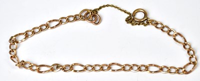 Lot 803 - A 9ct gold Figaro bracelet with safety chain,...