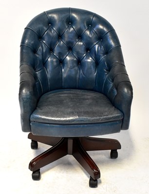 Lot 22 - A contemporary button pressed blue leather...