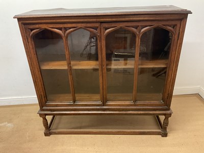 Lot 644 - An oak display cabinet, with Gothic Revival...