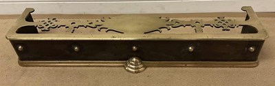 Lot 150 - A brass and metal fender, 17 x 114 x 26cm.