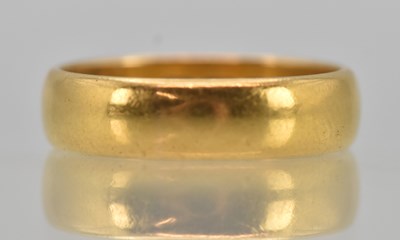 Lot 1192 - A 22ct yellow gold band ring, size P, approx 6g.