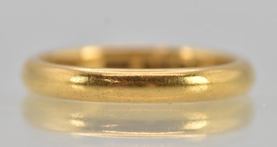 Lot 1204 - A 22ct yellow gold band ring, size M, approx 4....