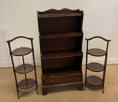 Lot 678 - A small reproduction mahogany waterfall...