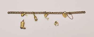 Lot 462 - A yellow metal curb link bracelet set with 9ct...