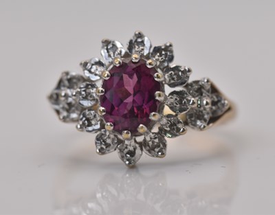 Lot 481 - A 9ct yellow gold floral set dress ring, size...