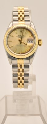 Lot 1617 - ROLEX; a lady's stainless steel and gold...