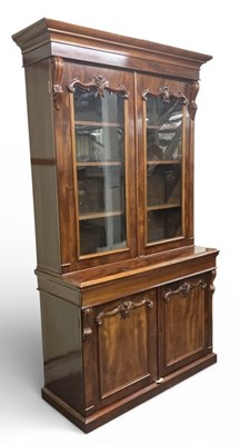 Lot 48 - A large Victorian mahogany bookcase, the...