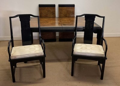 Lot 626 - A Korean elm and ebonised dining room suite,...
