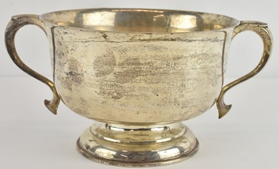Lot 1026 - A George V hallmarked silver twin handled...