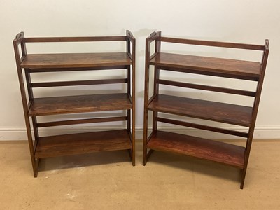 Lot 675 - A pair of folding bookshelves, height 93cm,...