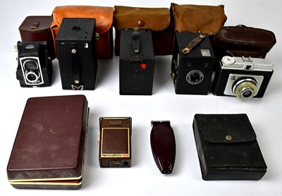 Lot 379 - Two Kodak Brownie box cameras in a canvas...