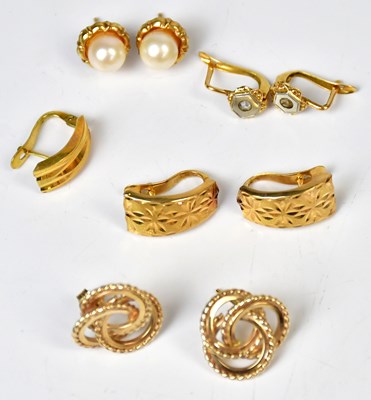 Lot 832 - A pair of 9ct yellow gold stud earrings in the...