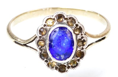 Lot 777 - A 9ct yellow gold floral cluster ring, with...