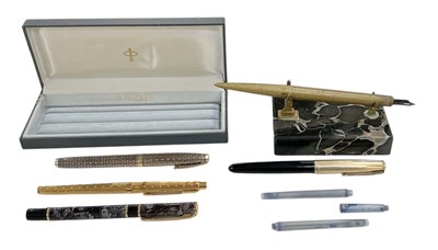 Lot 300 - SHEAFFER; a 14ct yellow gold nibbed fountain...