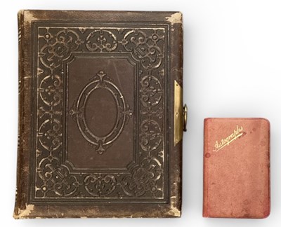 Lot 419 - A Victorian leather bound photograph album,...