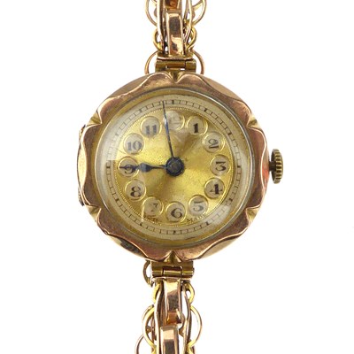 Lot 1110 - A ladies' vintage 9ct gold wristwatch, the...