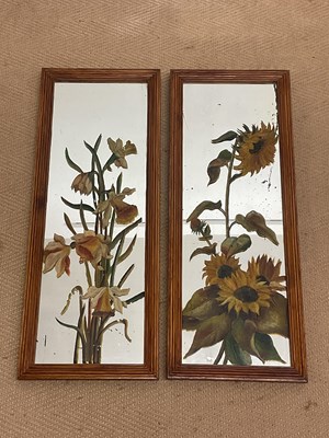 Lot 685 - A pair of decorative wall mirrors with hand...