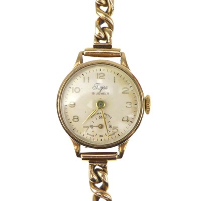 Lot 1106 - TROJAN; a ladies' vintage 9ct gold wristwatch,...