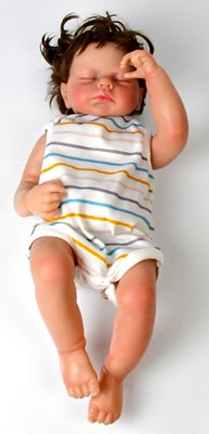 Lot 255 - A Reborn doll with accessories and bag.