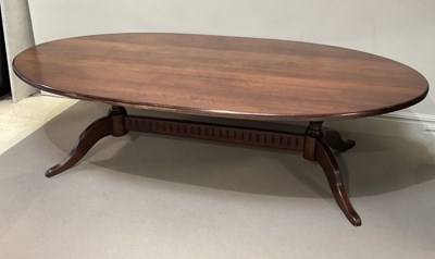 Lot 1059 - A large reproduction oak oval dining table,...