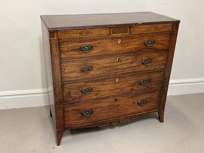 Lot 1125 - An early 19th century mahogany chest of four...