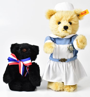 Lot 257 - STEIFF; a bear dressed as a nurse, with button...
