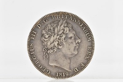 Lot 550 - A George III crown, dated 1819.