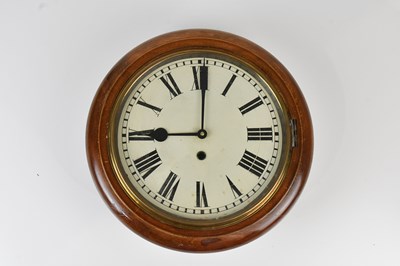 Lot 1180 - An early 20th century station type clock, the...