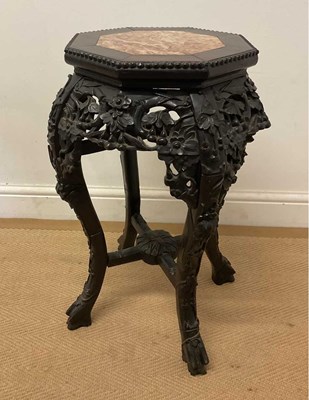 Lot 127 - A Chinese ebonised hardwood jardiniere stand,...