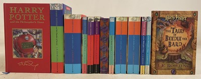Lot 389 - J K ROWLING; a collection of thirteen books,...