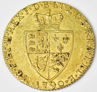 Lot 579 - A George III spade guinea, fifth head, 1790,...