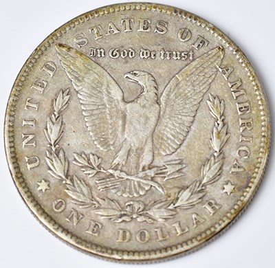 Lot 609 - An 1878 silver dollar, approx. 26.6g. Please...
