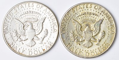 Lot 621 - Two 1964 silver half dollars, approx. combined...