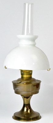 Lot 84 - A brass paraffin lamp with opaque glass shade...