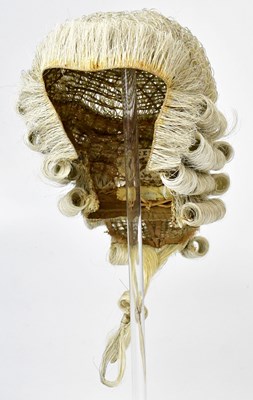 Lot 213 - A vintage barrister's wig in original tin...
