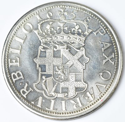 Lot 590 - A replica Oliver Cromwell half-crown, 1658,...