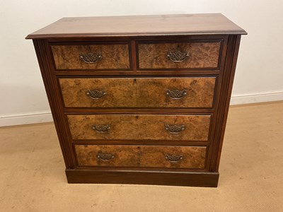 Lot 640 - A mahogany and walnut veneered fronted chest...