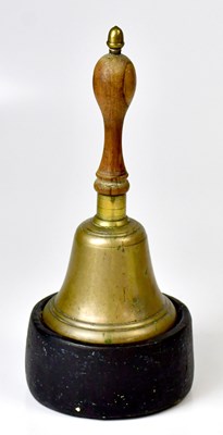 Lot 290 - A brass bell with a turned wooden handle,...