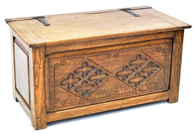 Lot 50 - A Georgian-style oak coffer with metal hinges...
