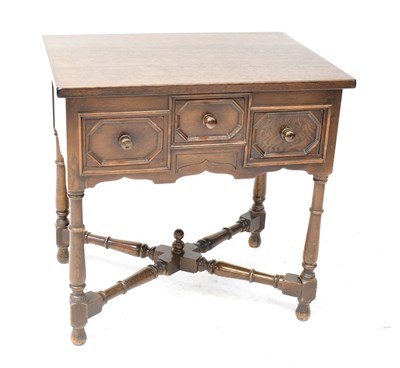 Lot 47 - A Jacobean-style side table with three carved...