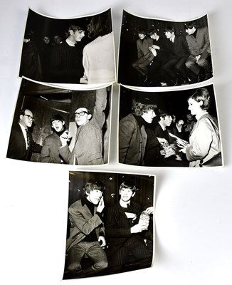 Lot 350 - THE BEATLES; fifteen black and white...