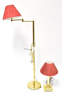 Lot 97 - A brass standard lamp with an extending arm,...